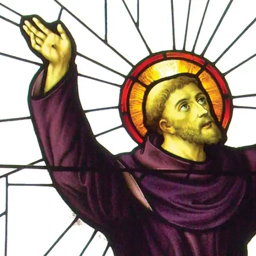 Assisi Szent Ferenc kezén a stigmával áldja Istent
